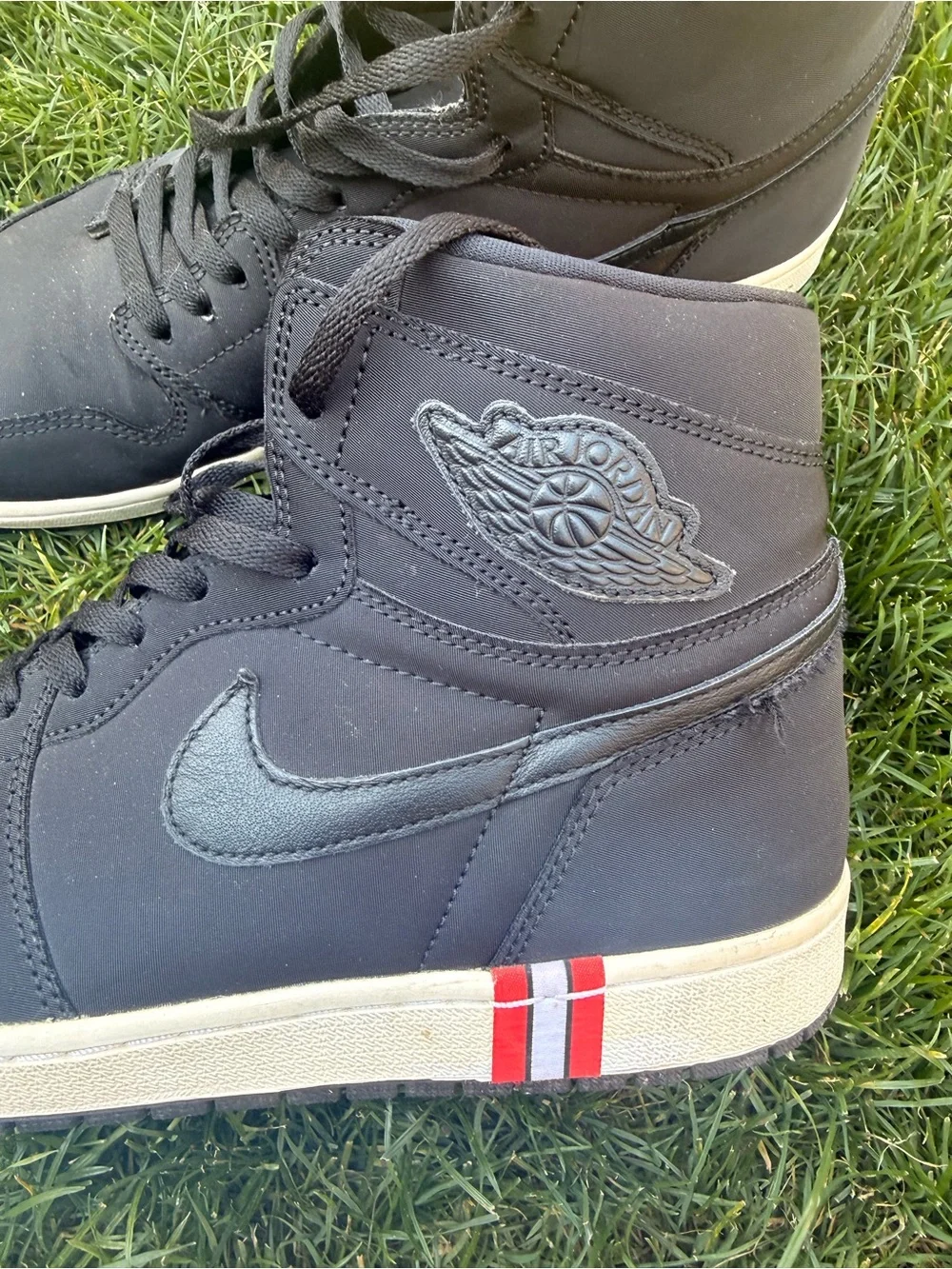 Nike Men’s Black High-Top Sneakers with Red Accent